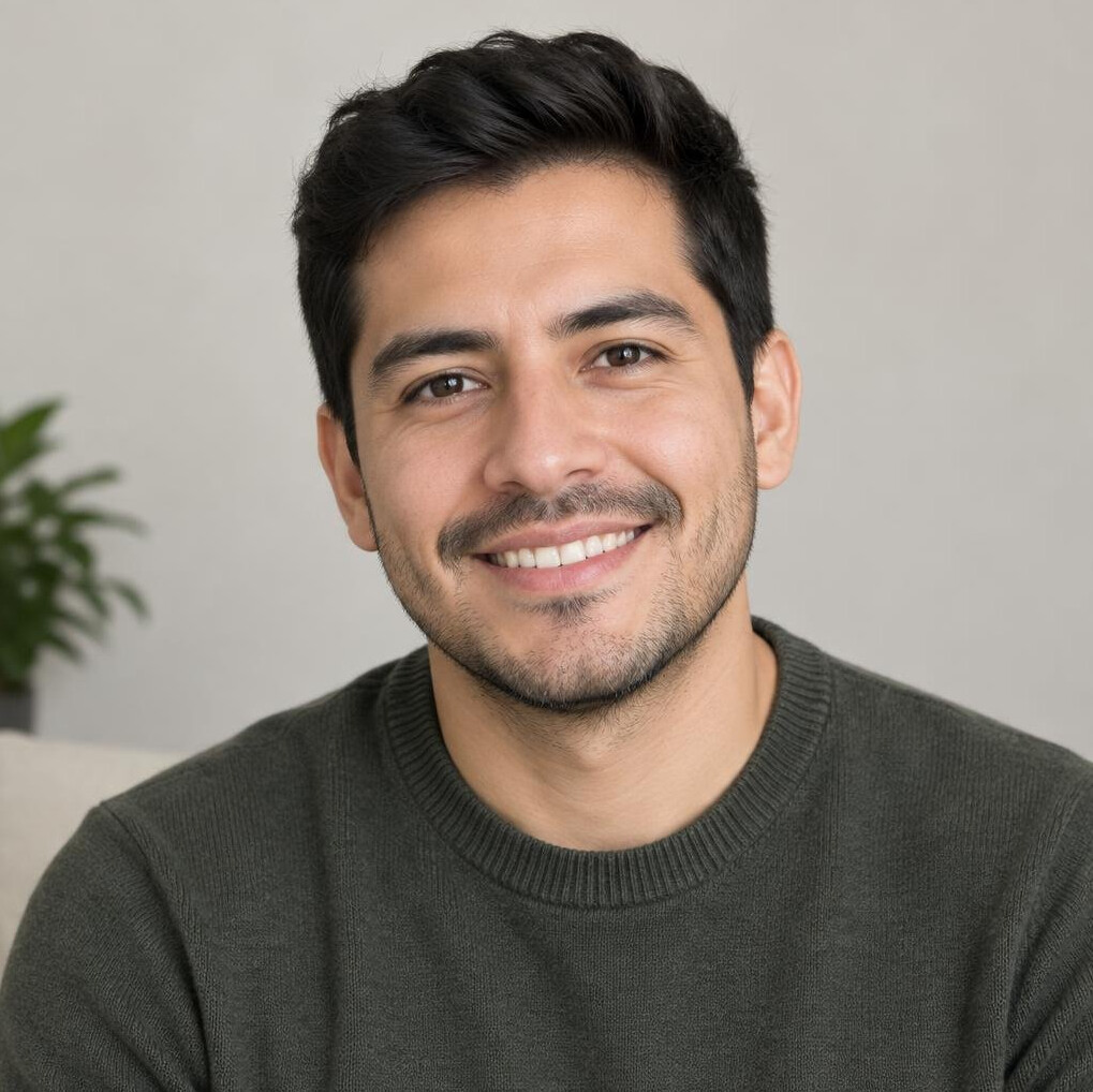 Portrait of a young man with light stubble smiling